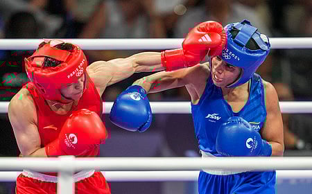 India's Nikhat Zareen and China's Wu Yu during their women's 50kg Round of 16 bout at the 2024 Summer Olympics, in Paris