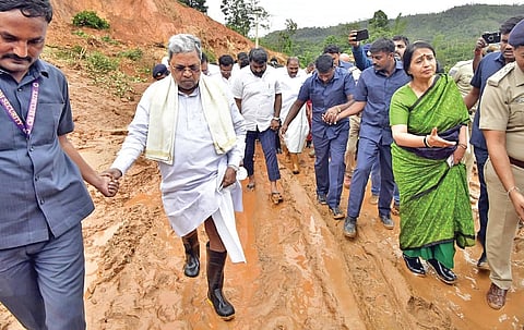 Chief Minister Siddaramaiah inspects the hill collapse site at Shiradi Ghat, in Hassan, on Saturday.