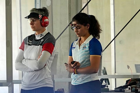 India's Manu Bhaker, right, competes in the 25m pistol precision women's qualification round at the 2024 Summer Olympics