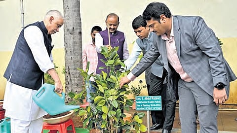 Governor S Abdul Nazeer plants a sapling at Raj Bhavan in Vijayawada 