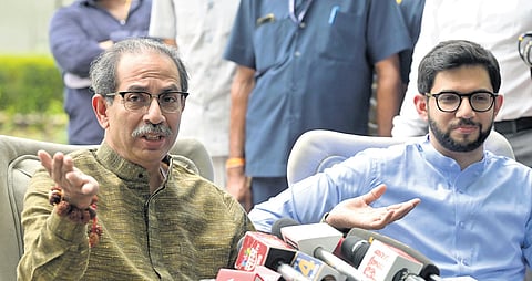 Shiv Sena (UBT) chief Uddhav Thackeray and son Aditya Thackeray address a 
press conference in New Delhi