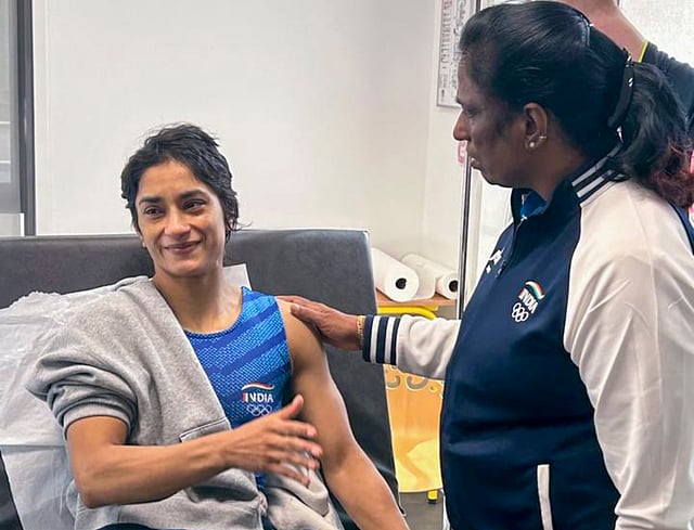 IOA President PT Usha meets Vinesh Phogat after the latter was receiving medical attention following her disqualification.