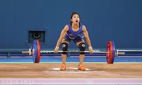 India's Mirabai Chanu competes during the clean and jerk stage of the women's 49kg weightlifting event at the Paris Olympics