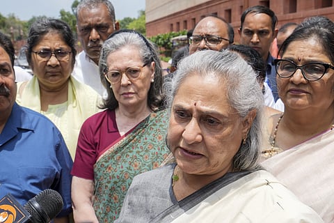 Samajwadi Party MP Jaya Bachchan speaks to the media as Congress MPs Sonia Gandhi, Rajeev Shukla and others look on during Monsoon session of Parliament, in New Delhi, Friday, Aug. 9, 2024.