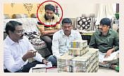 ACB officials list the assets seized from the residence of Nizamabad Municipal Corporation in-charge Revenue Officer Dasari Narendar (circled) on Friday
