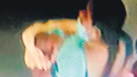 CCTV footage of the woman fleeing with the infant