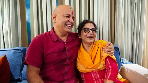 AAP leader Manish Sisodia with wife upon his arrival at his residence after being released from the Tihar Jail following his bail granted by the Supreme Court on Aug. 9, 2024.