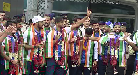 Indian men's hockey team, winners of Paris Olympic Bronze medal arrives at IGI airport in New Delhi on Saturday. 