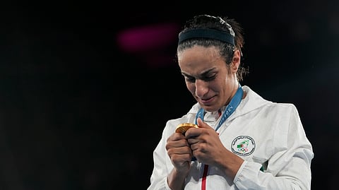 Gold medalist Algeria's Imane Khelif attends a medals ceremony for the women's 66 kg final boxing match at the 2024 Summer Olympics.