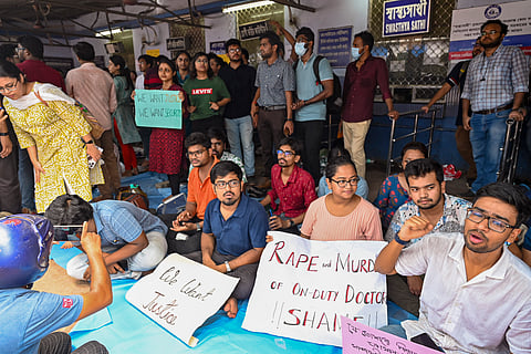 Junior doctors protest against the alleged rape and killing of a trainee doctor of RG Kar Medical College and Hospital.