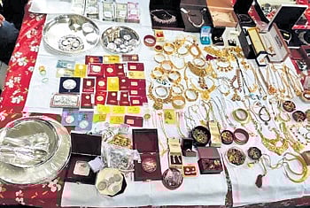 Gold ornaments found during raid.