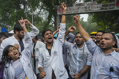 Doctors protest against the sexual assault and killing of a postgraduate trainee doctor in Kolkata, in New Delhi, Monday, Aug. 12, 2024.