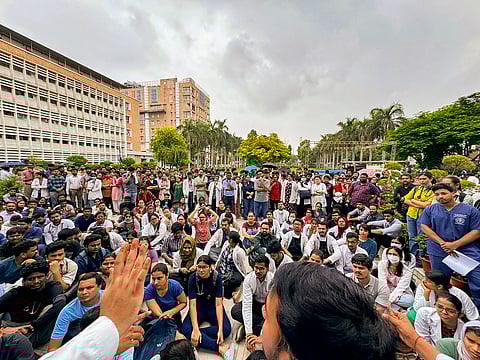 Medics stage a protest against the sexual assault and murder of a postgraduate trainee doctor in Kolkata, at AIIMS, in New Delhi, Monday, Aug. 12, 2024.
