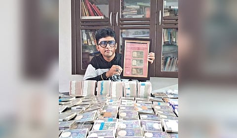 Arvind Kumar Pai with his one-rupee currency collection 
