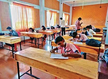 Left-handers engaged in a classroom activity