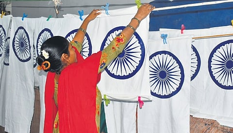 A woman at work at the Tricolour facility, at the Khadi Gramodyoga unit, in Bengeri of Hubballi district