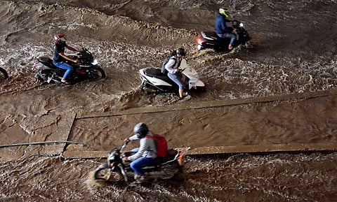  Water logged at an underpass near Jayadeva Hospital due to rain in Bengaluru on Monday.