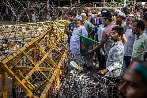 Protesters march to block the house of Sheikh Mujibur Rahman, ‘Bangabandhu’ the first president of independent Bangladesh and father of ousted ex-premier Sheikh Hasina, in Dhaka on August 15, 2024, to mark the anniversary of his assassination.