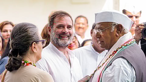 Congress President Mallikarjun Kharge with party leaders Sonia Gandhi and Rahul Gandhi during the 78th Independence Day celebrations at party headquarters, in New Delhi.