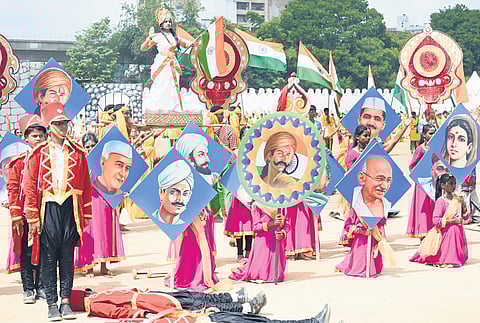 Schoolchildren enact scenes from the freedom struggle during Independence Day celebrations at Maneskshaw Parade Ground