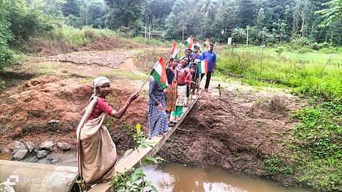 For over a year now, the tribes have laid a broken electric pole as a makeshift footbridge 