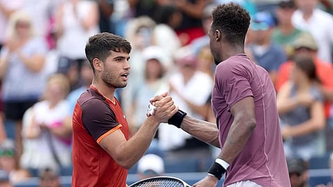Spain's Carlos Alcaraz congratulates Gael Monfils of France after their match.