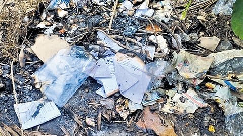 Burnt documents on the premises of the Polavaram project office 