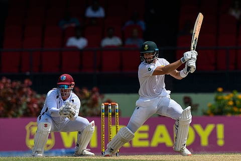 Aiden Markram (R) of South Africa hits 4 as Joshua Da Silva (L) of West Indies watches during Day 2 of the 2nd Test match between West Indies and South Africa at Guyana National Stadium in Providence, Guyana, on August 16, 2024.
