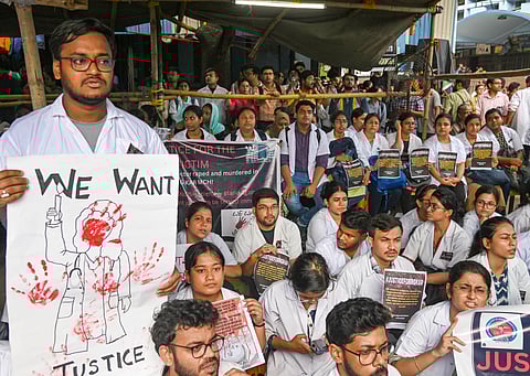 Dental college students stage a protest during the 24-hour nationwide strike called by the Indian Medical Association (IMA) demanding justice for the woman doctor who was allegedly raped and murdered at R G Kar Medical College and Hospital, in Kolkata, Saturday, Aug. 17, 2024. 