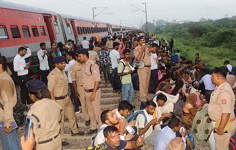  Police personnel during a rescue operarion after coaches of the Sabarmati Express passenger train derailed between Kanpur and Bhimsen station in Uttar Pradesh, Saturday, Aug. 17, 2024. 