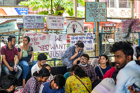 Junior doctors stage a protest amid the 24-hour nationwide strike called by the Indian Medical Association (IMA) demanding justice for the woman doctor who was allegedly raped and murdered at R G Kar Medical College and Hospital, at SSKM hospital in Kolkata, Saturday, Aug. 17, 2024.