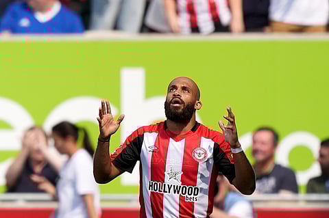 Brentford's Bryan Mbeumo celebrates scoring during the English Premier League soccer match between Crystal Palace and Brentford at the Gtech Community Stadium.