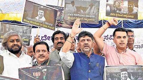 DyCM and KPCC president DK Shivakumar and ministers protest against Governor Thaawarchand Gehlot at Freedom Park in Bengaluru on Monday 