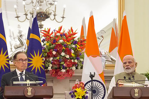 Prime Minister Narendra Modi and his Malaysian counterpart Anwar Ibrahim during the joint press statement after their meeting, at Hyderabad House, in New Delhi, Tuesday, Aug. 20, 2024. 