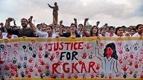Doctors stage a protest demanding justice for a woman doctor who was allegedly raped and murdered at Kolkata's R G Kar Medical College and Hospital.