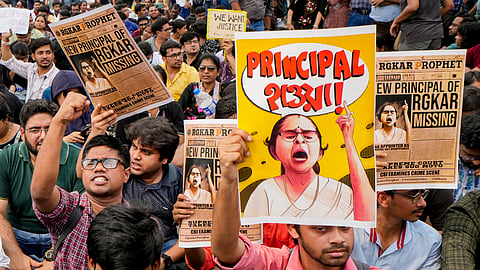 Doctors shout slogans outside the Swasthya Bhawan during their protest march over the sexual assault and murder of a postgraduate trainee doctor, in Kolkata.
