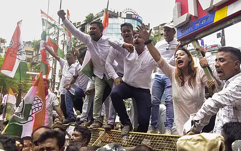 Congress workers prtoest in front of the ED office against the alleged Adani mega scam, in Guwahati, Thursday, Aug. 22, 2024. 