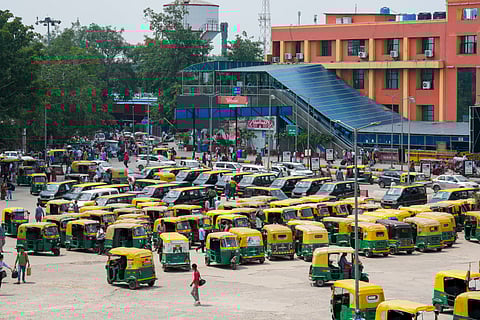 Taxis and auto rickshaws stand parked outside New Delhi Railway Station during a 2-day strike called by auto and taxi driver unions to protest against the app-based cab services, in New Delhi, Thursday, Aug. 22, 2024.