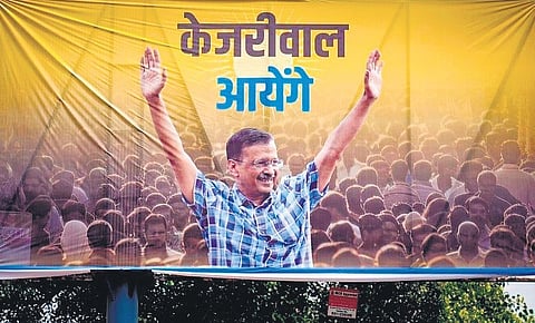 A hoarding in city displaying AAP’s new campaign slogan | X