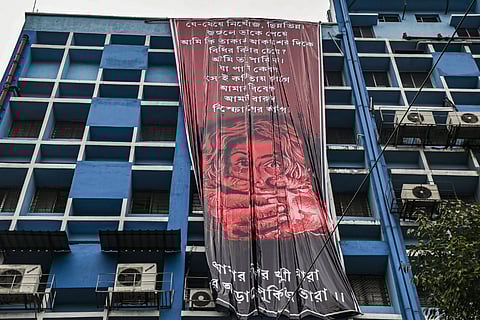 Doctors stage a protest demanding justice for a woman doctor who was allegedly raped and murdered at Kolkata's R G Kar Medical College and Hospital.