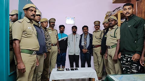 Tamil Nadu forest department officials with the three arrested persons