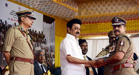 CM MK Stalin presenting medals to police personnel during police medal function at Rajarathinam Stadium. Also seen Shankar Jiwal, DGP TN police.