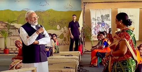 Prime Minister Narendra Modi during an interaction with 'Lakhpati Didis', in Jalgaon.