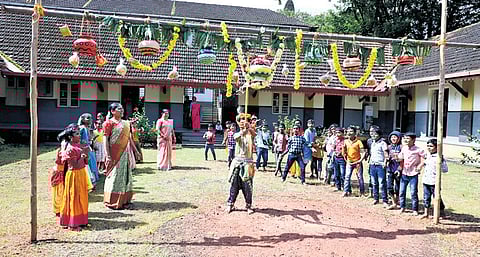 Students participate in the Mosaru Kudike at Canara Lower Primary Kannada Medium School in Mangaluru