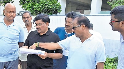 GMC chief P Srinivasulu inspects encroachments in GMC lands on Tuesday 