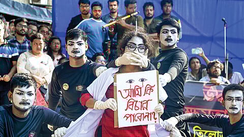 Junior doctors perform mime show to protest against the alleged rape and murder of a trainee doctor, in Kolkata
