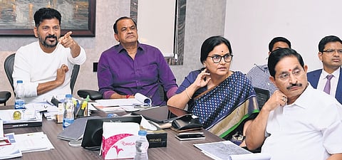 Chief Minister A Revanth Reddy gestures during a review meeting on the alignment of the Regional Ring Road at his residence in Jubilee Hills, Hyderabad on Wednesday
