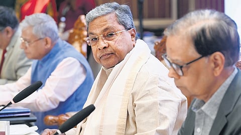 Chief Minister Siddaramaiah and 16th Finance Commission Chairman Dr Arvind Panagariya (foreground) in Bengaluru on Thursday