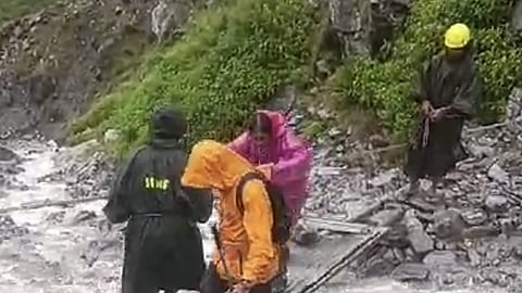 A sudden downpour on Thursday afternoon led to a flash flood in the Valley of Flowers trekking route, sweeping away a concrete bridge over a stream and leaving 189 tourists stranded.