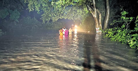 NH 163 in Mulugu district under Tadvai PS limits flooded as Jalagalancha Vagu overflows on Saturday; 